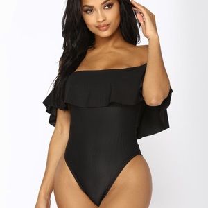 FASHION NOVA NWT “flounce with it” one piece suit